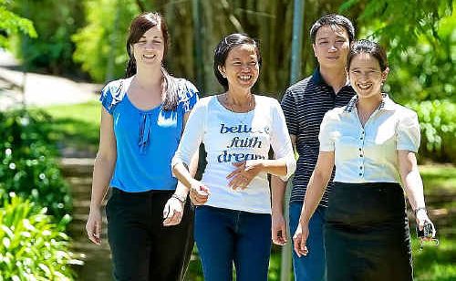 International office staff member Emily Suffolk, left, with students Nguyen Thi Hai Tra, Dang Phuong Thao and Hung Tuan Nguyen. International office staff member Emily Suffolk, left, with students Nguyen Thi Hai Tra, Dang Phuong Thao and Hung Tuan Nguyen.